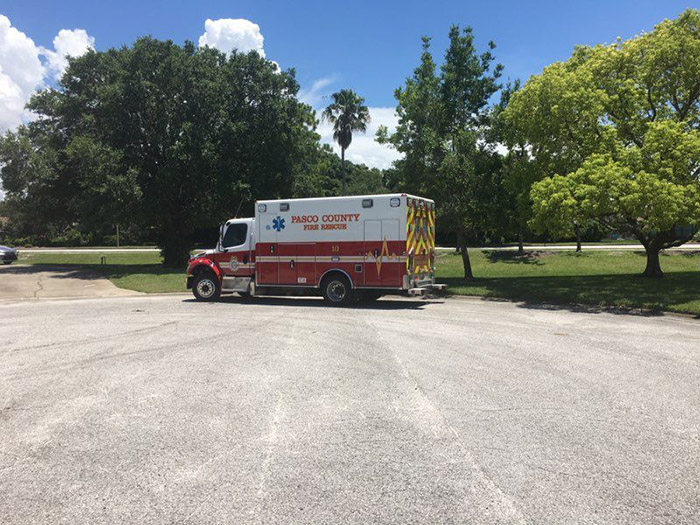 firefighters finish laying sod for man heart attack