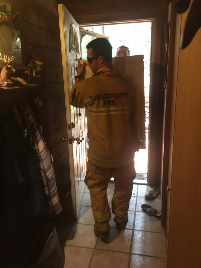 firefighters help woman