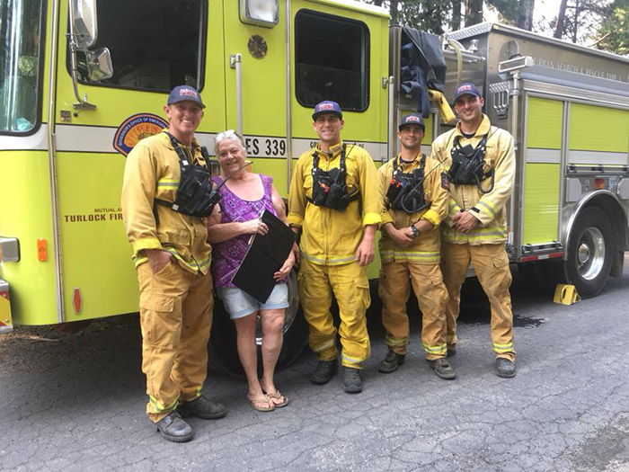 firefighters help woman