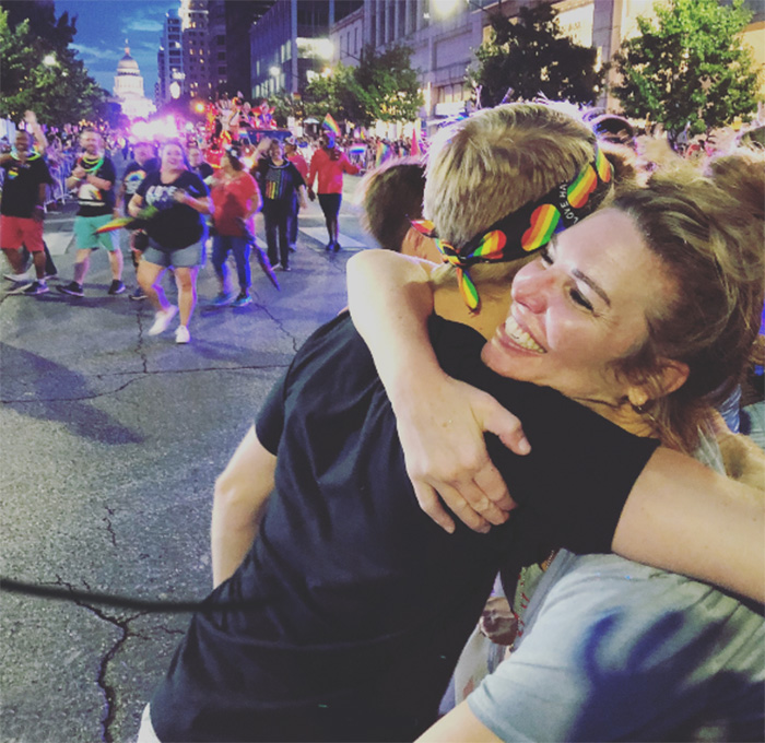 free mom and dad hugs church at pride