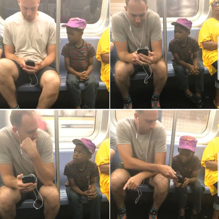 man gives kid his phone on train