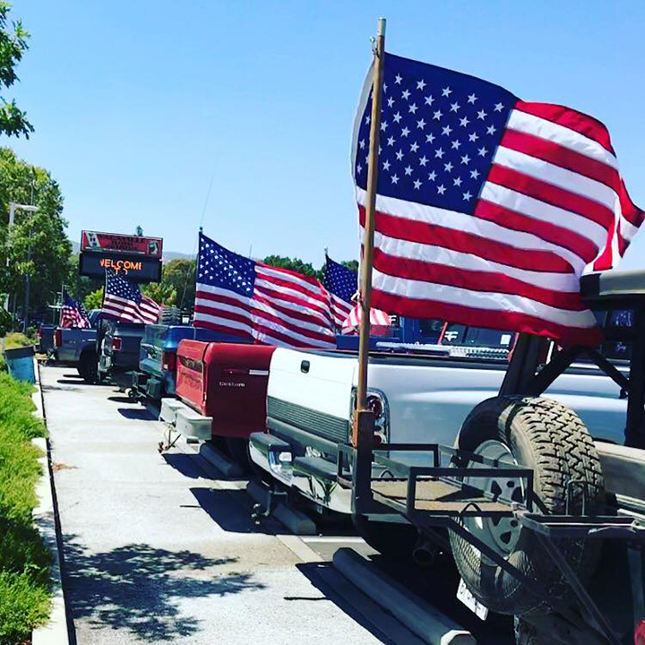 students honor fallen officer with flags