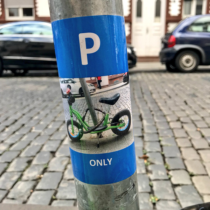 child gets own parking spot for bike