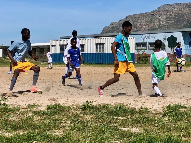 man starts soccer academy in Zimbabwe waiter tips