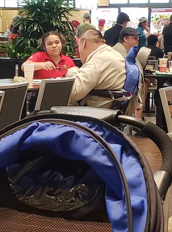 chic fila employee feeds disabled man