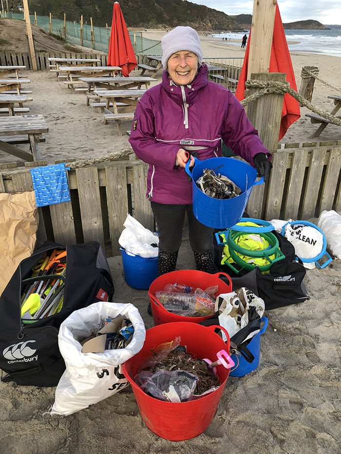 grandmother cleans beaches