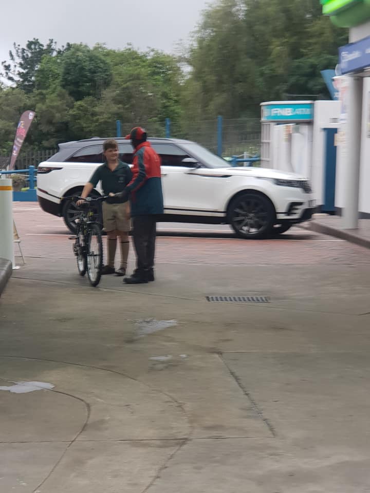 boy buys gas station worker bike