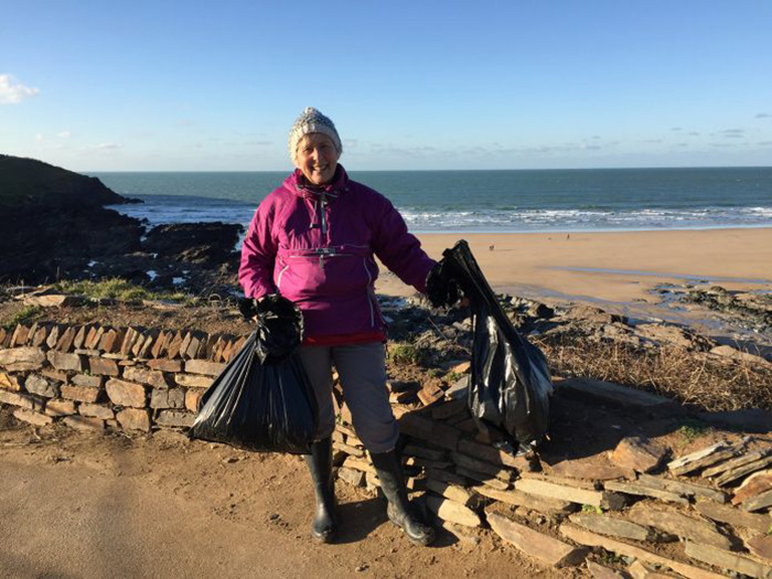 grandmother cleans beaches