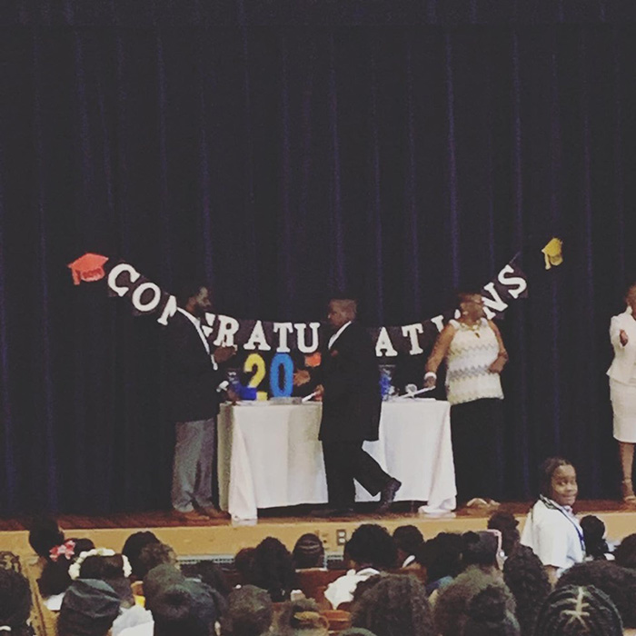 teacher gives student his shoes to graduate