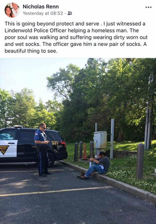 cop gives homeless man socks