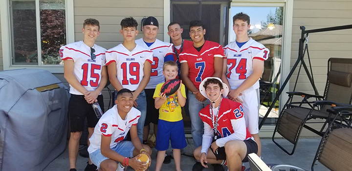 football team shows up to kids birthday autism