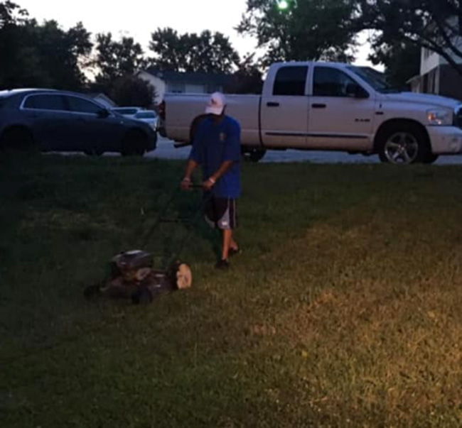 man mows lawn for free