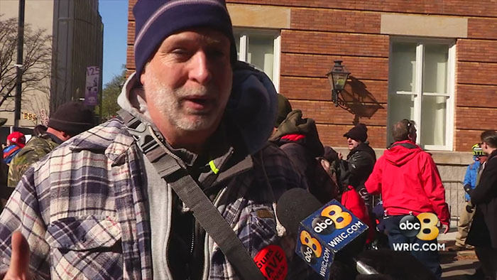 gun activists clean streets during protest