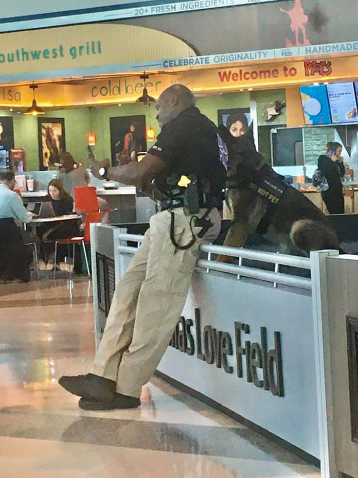 police officer selfies with dog and shows him airport dallas