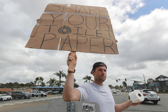  Man  Sets Up Toilet  Paper Swap On Street Corner