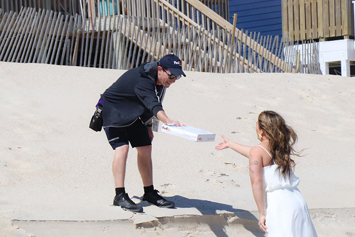 fedex man wedding ring beach