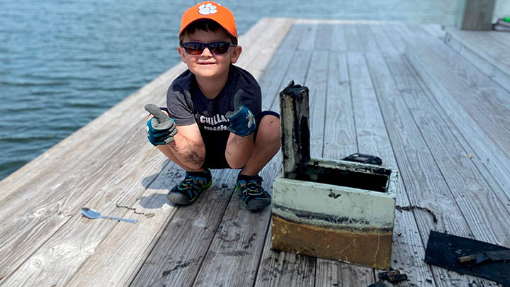 boy fishing finds stolen safe