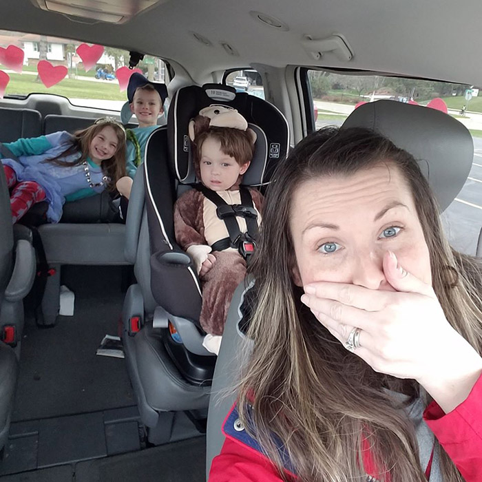 mom accidentally joins car parade in minivan