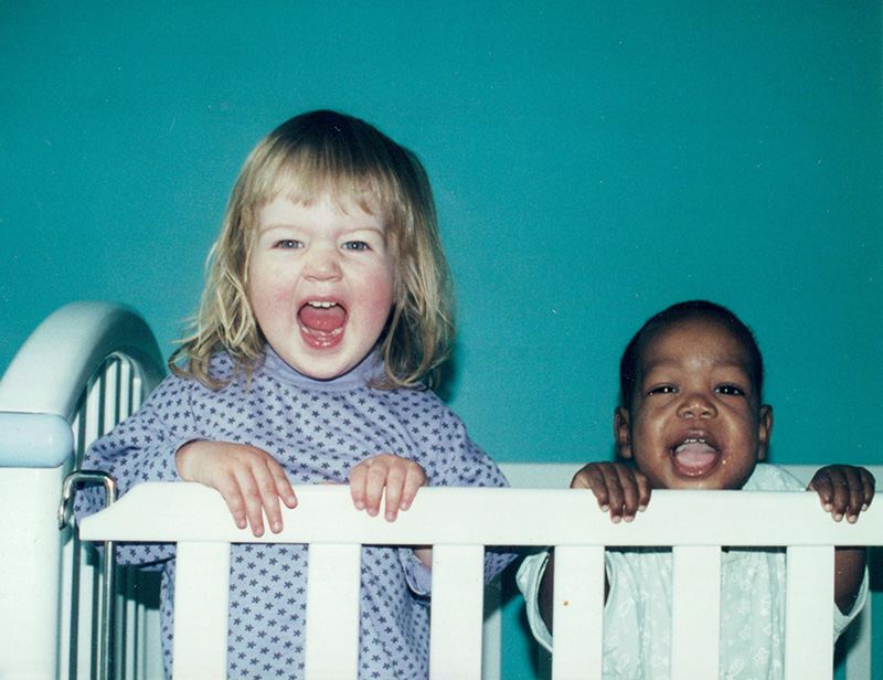 black and white siblings recreate baby photos