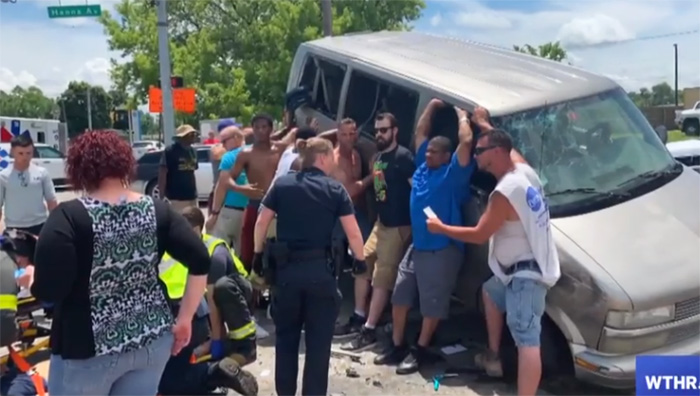 strangers lift van off woman trapped