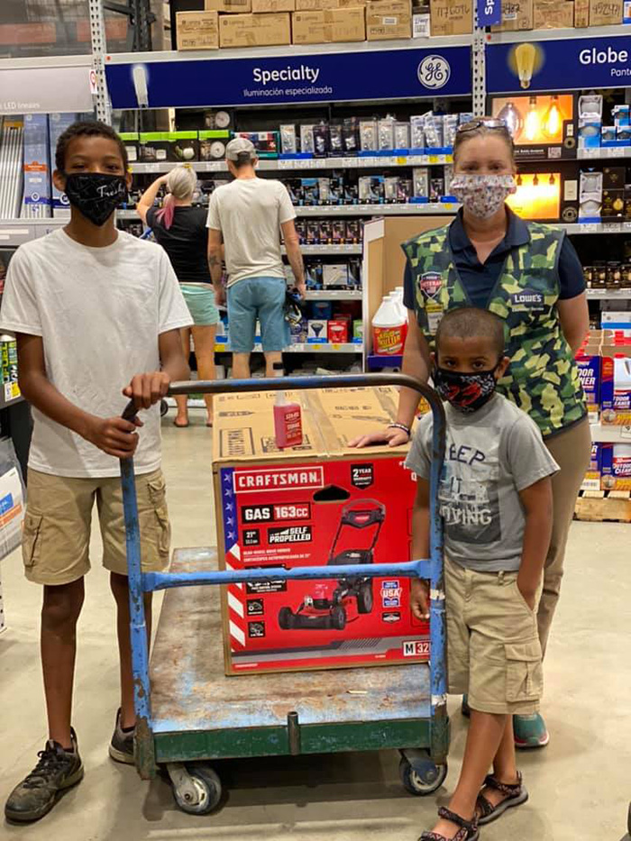 lowes gives lawnmower to hardworking boy