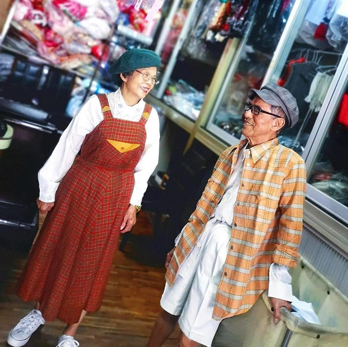 dry cleaning couple pose in clothes left behind