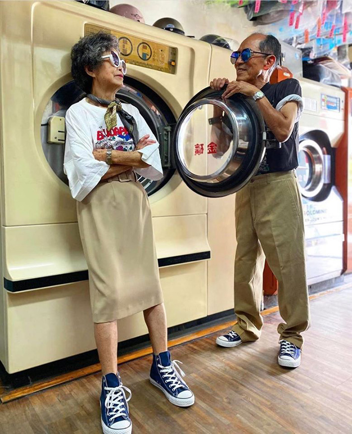 dry cleaning couple pose in clothes left behind