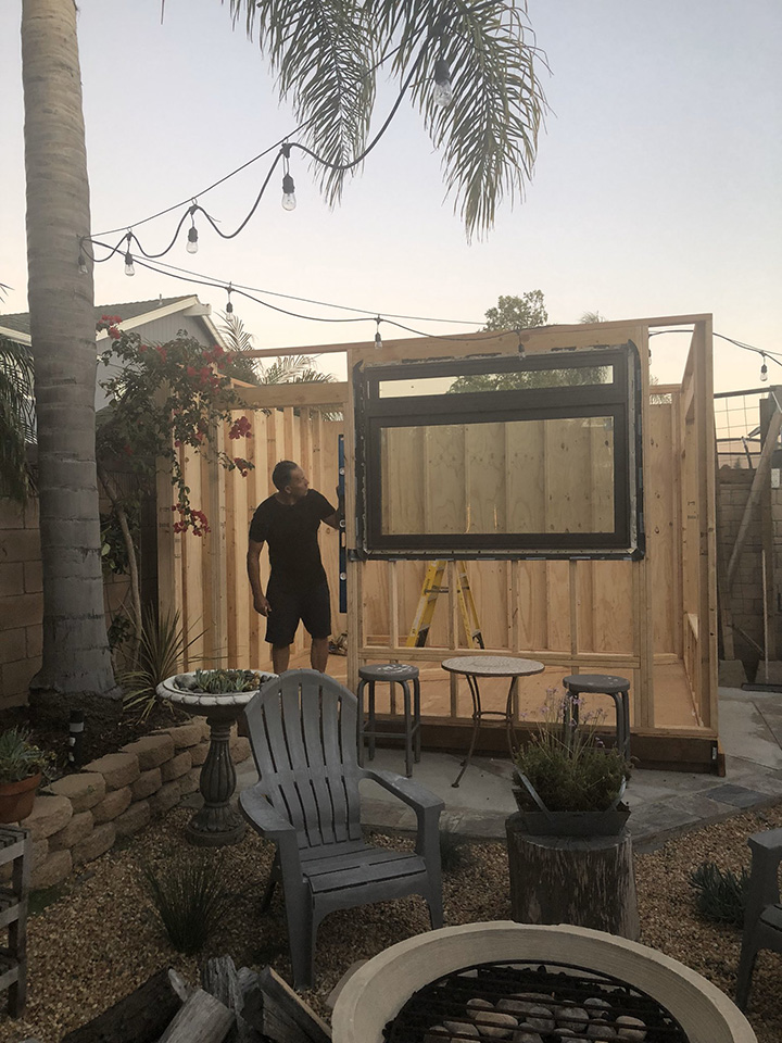 man builds coffee shop in backyard