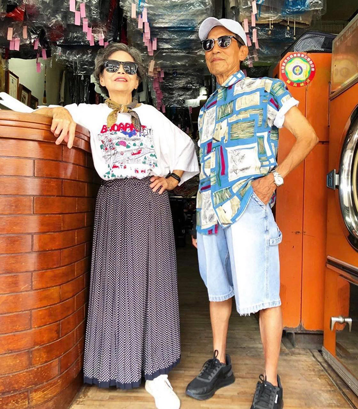 dry cleaning couple pose in clothes left behind