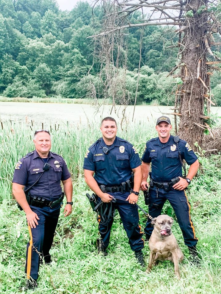 officer saves dog with kayak