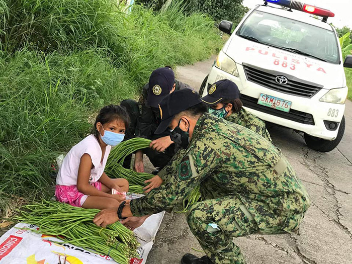 police buy all vegetables from little girl