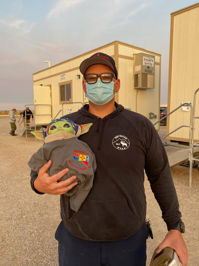 baby yoda fights fires