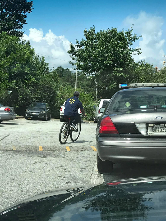 officer gives man bike