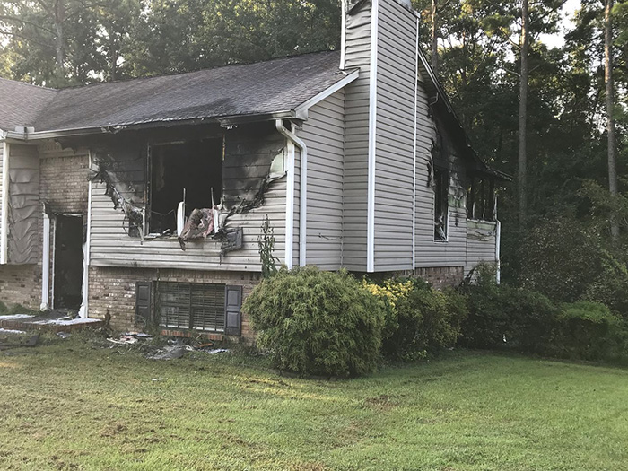 dog bark saves family from fire