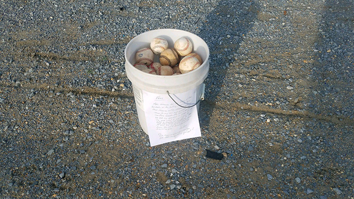 grandpa bucket of baseballs