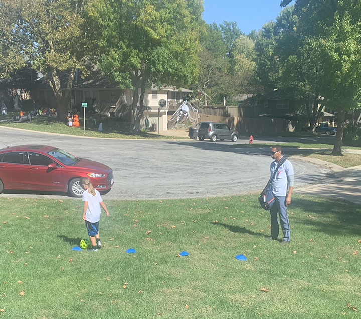 mailman helps girl train for soccer