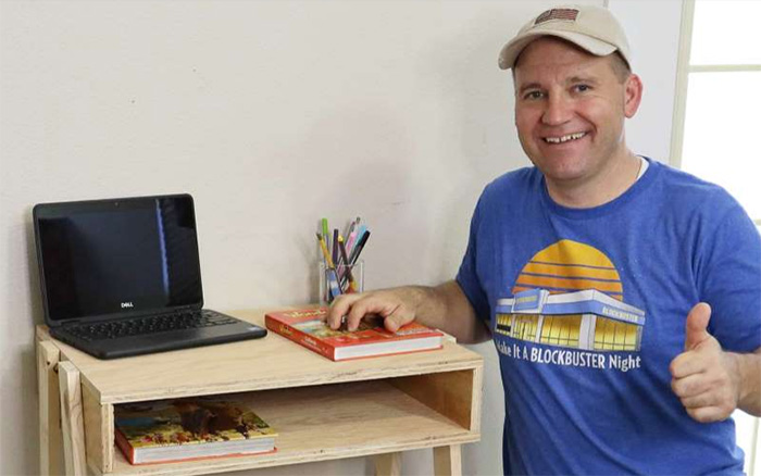 dad builds desks for students in need