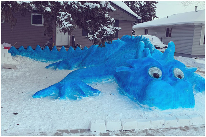 Woman Builds Giant Snow Dragon To Make People Smile