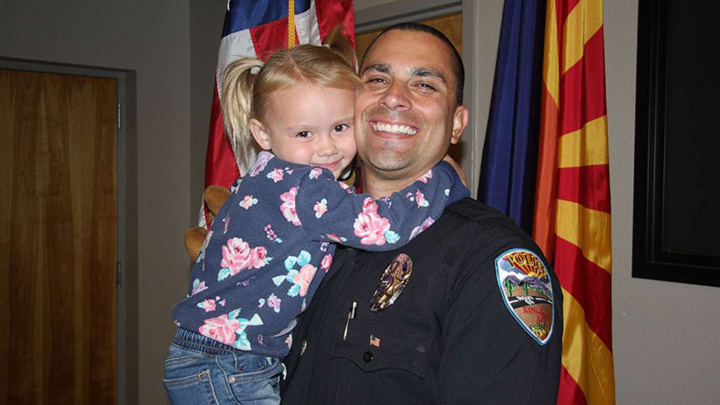 police officer adopts girl Brian Zach