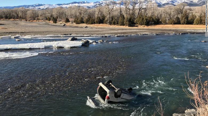 trooper rescues driver freezing river