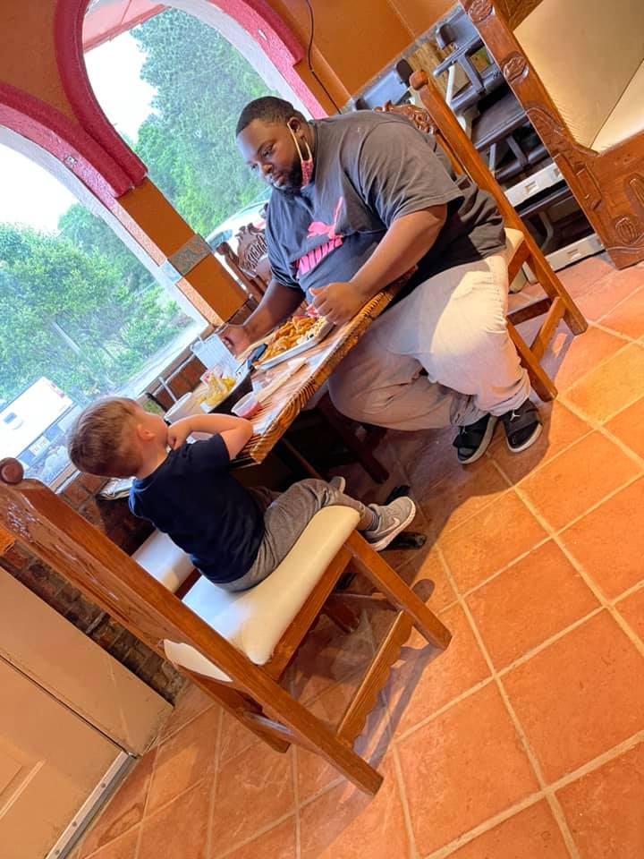 boy eats meal with stranger good news