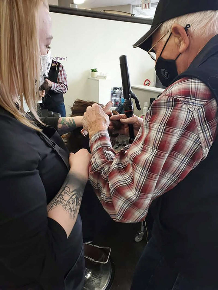 elderly man attends beauty school to help wife