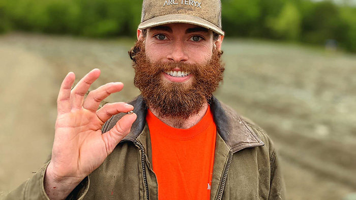 man digs up big diamond for engagement ring