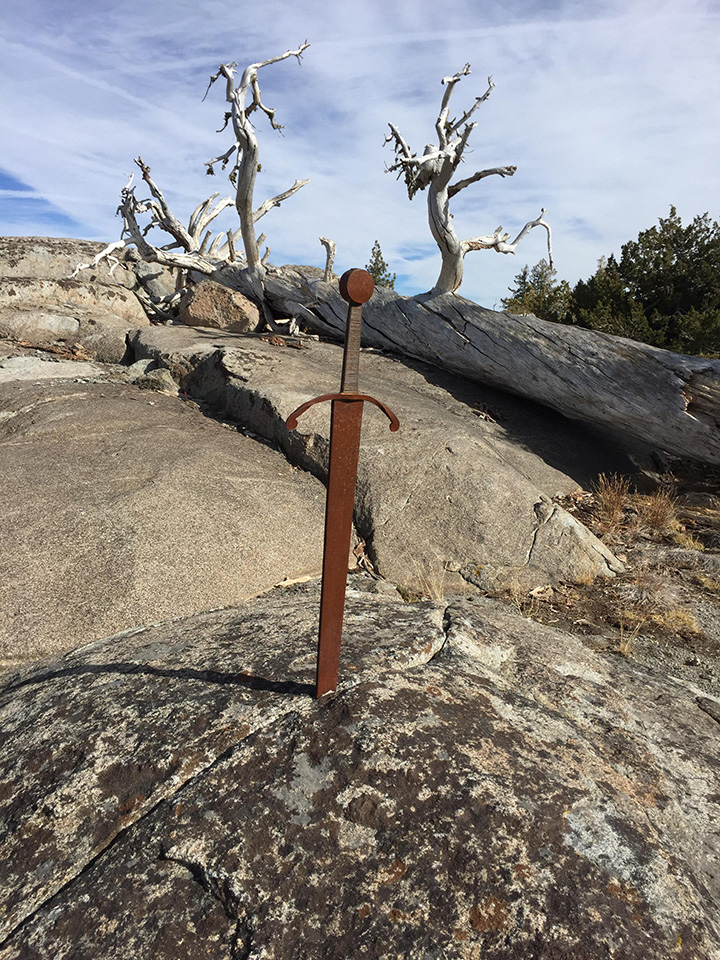 deer hunter finds sword in stone