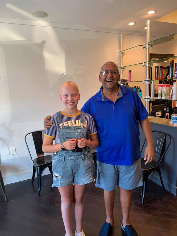 bagel shop owner shaves head for customer