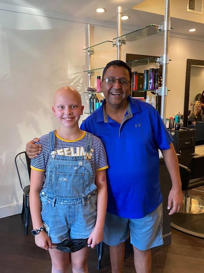 bagel shop owner shaves head for customer