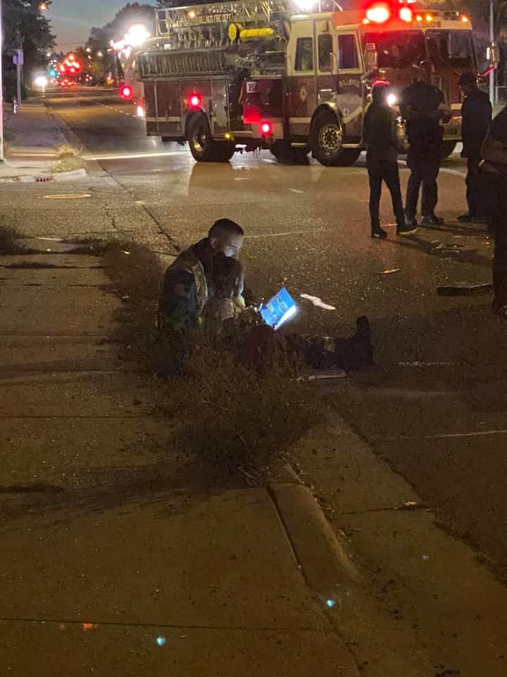 firefighter reads to girl after accident