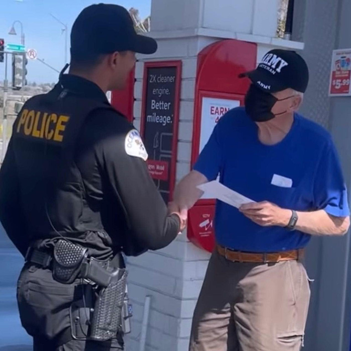 police surprise people at pump free gas money