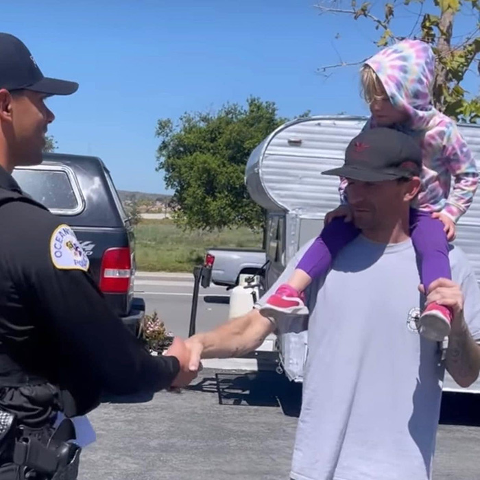 police surprise people at pump free gas money