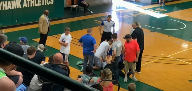 basketball player saves ref cpr